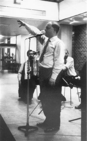 Picture of John Chapman on stage in 1963